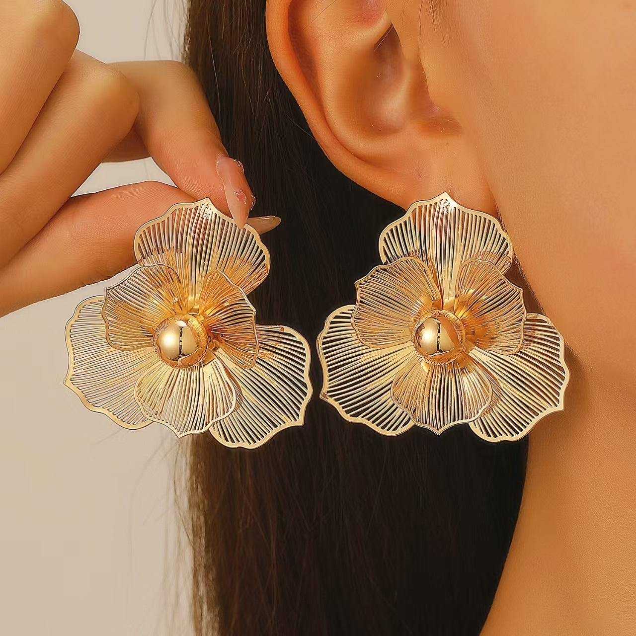 Golden Floral Stud Earrings with Pearl Center