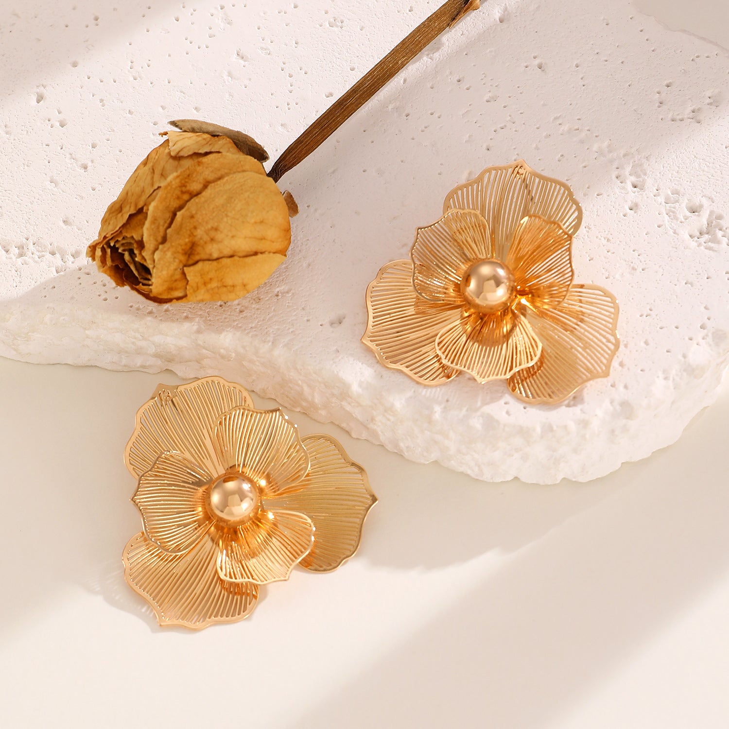 Golden Floral Stud Earrings with Pearl Center