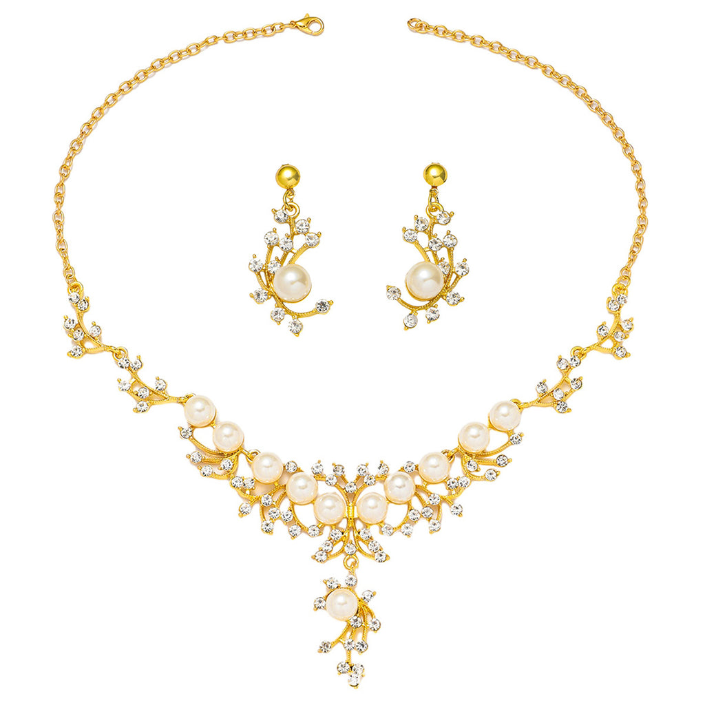 Close-up of floral pearl necklace showing diamond accents and intricate craftsmanship

