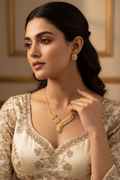 Elegant portrait of Indian model with leaf necklace