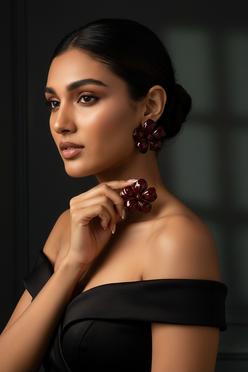 Model dramatic shot with burgundy flower earrings