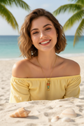 Young model wearing colorful fish pendant - beach vibes